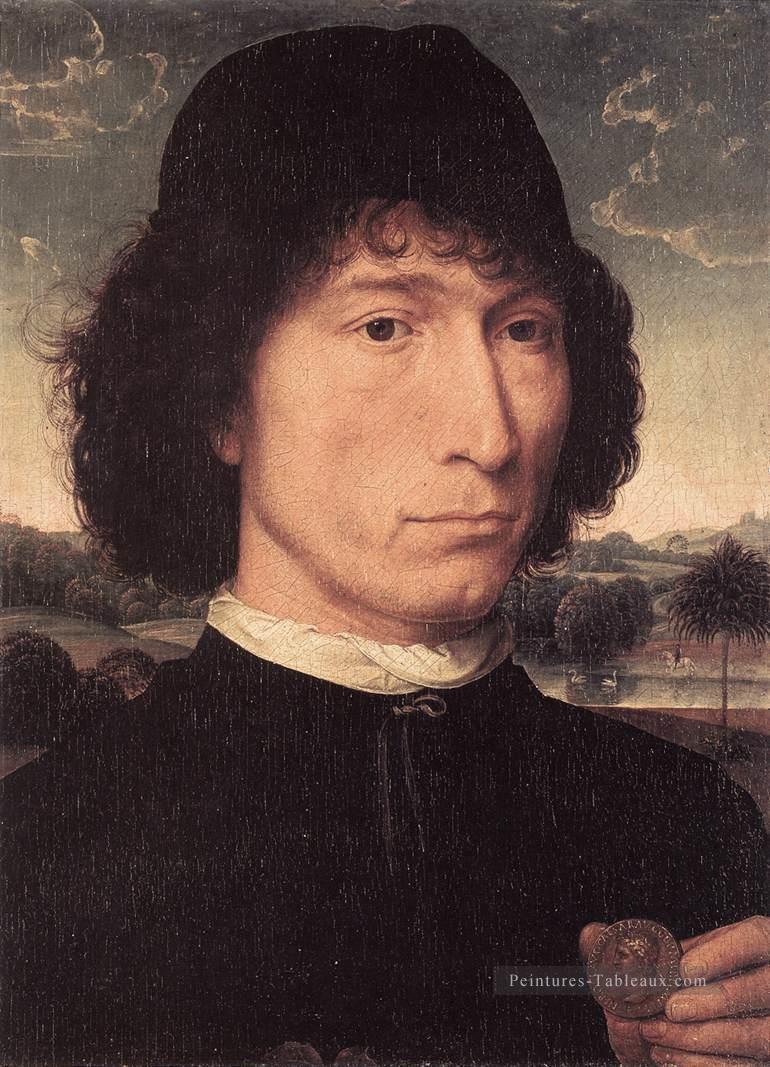 Portrait d’un homme avec une pièce romaine 1480 ou plus tard hollandais Hans Memling Peintures à l'huile